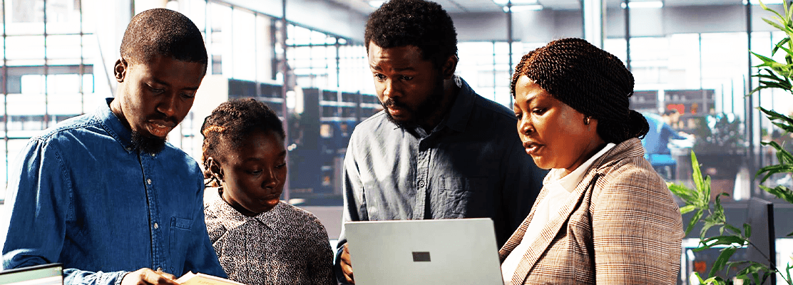 Kenyan professionals collaborating in a modern office