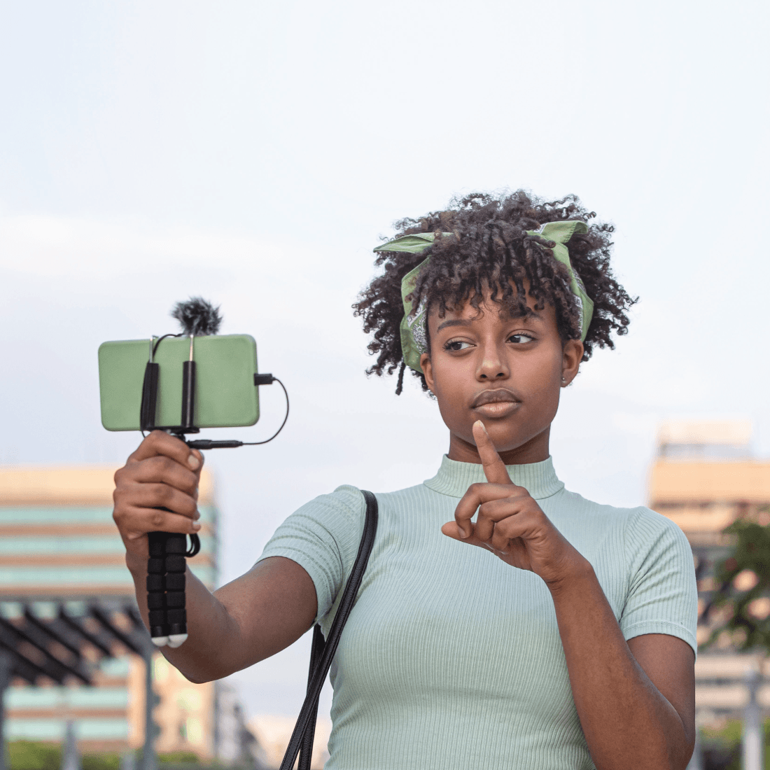 Young Kenyan video creator recording a vlog